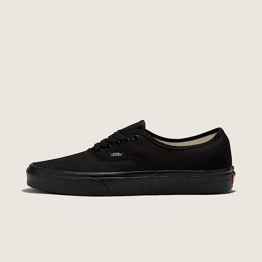 Black and white checkered sneaker on a light gray background