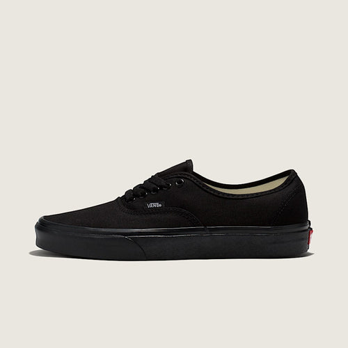 Black and white checkered sneaker on a light gray background