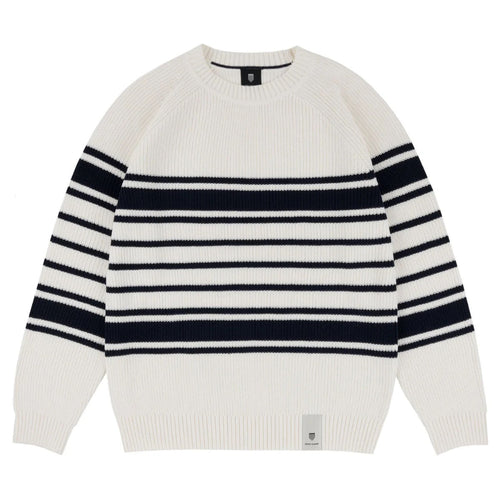 Pull en tricot aligné de la chaîne à la banque