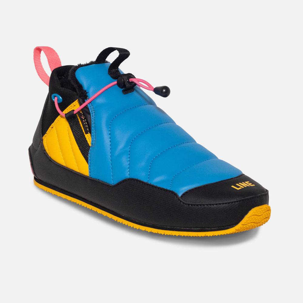 Colorful athletic shoe with black, blue, yellow, and pink accents on a white background